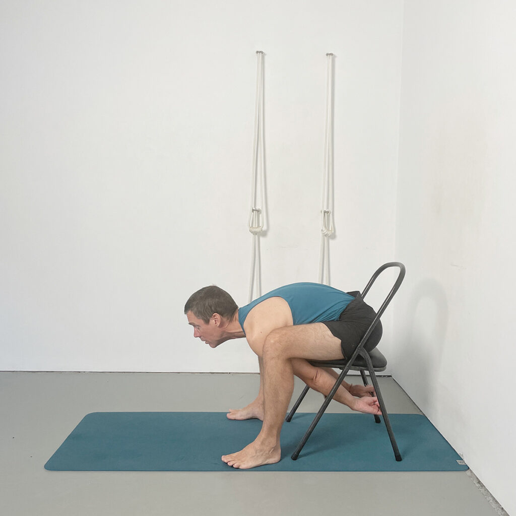 Chair Malasana (Back-Releasing Variation)