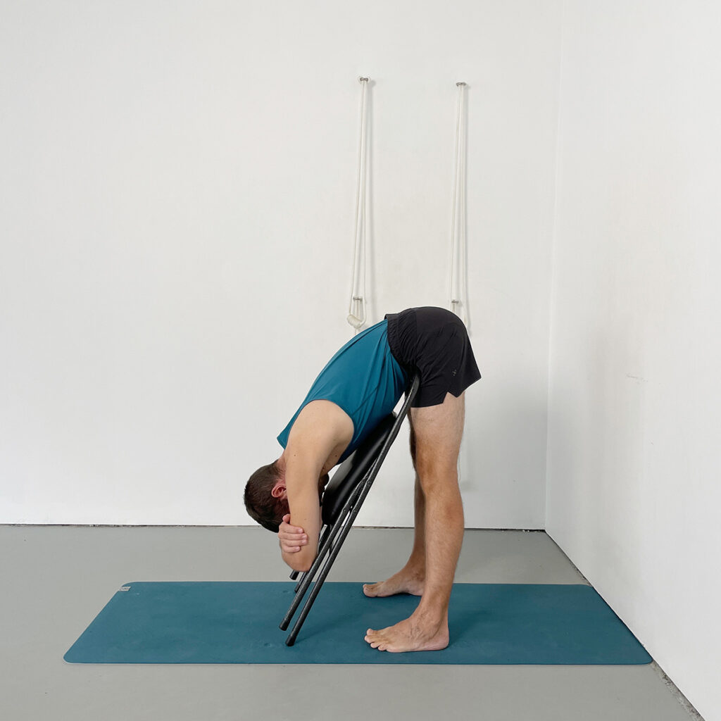 supported uttanasana with chair