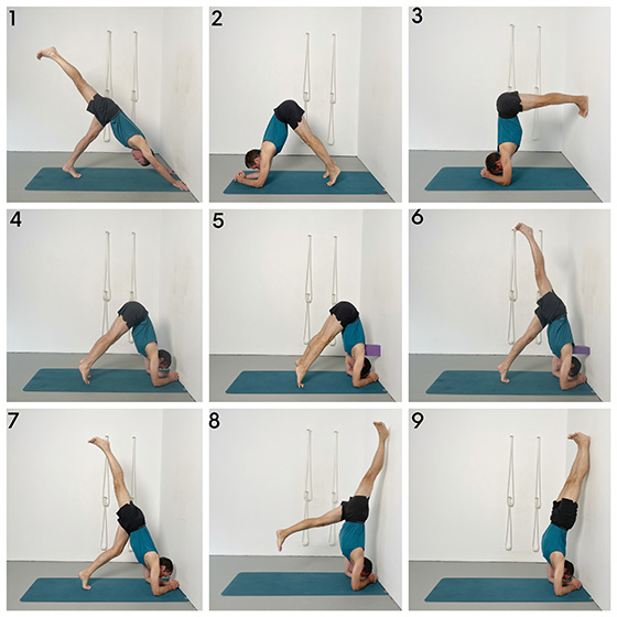 kickg up to the wall in sirsasana preparation