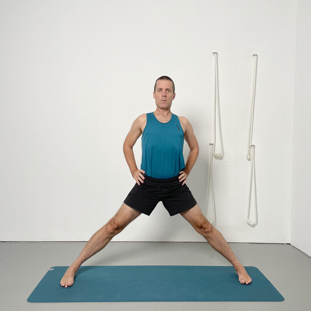 Wide-Legged Standing Base with Hands on Hips (Utthita Hasta Padasana) Iyengar Yoga for Beginners