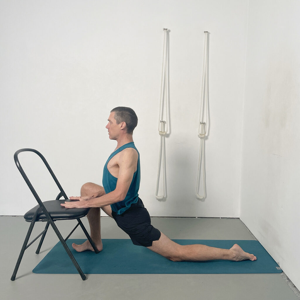 Eka pada rajakapotasana variation with chair